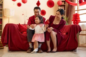 happy-asian-family-with-little-girl-celebrating-ch-2026